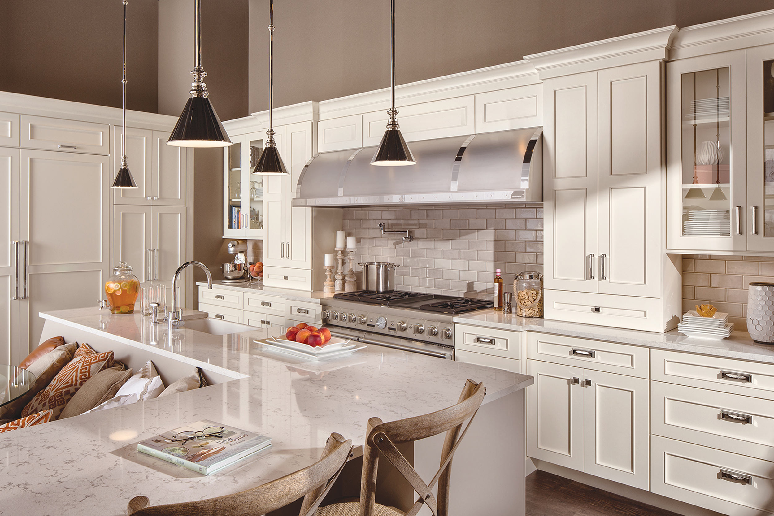 Natural wood kitchen cabinetry with visible grain and a stone countertop